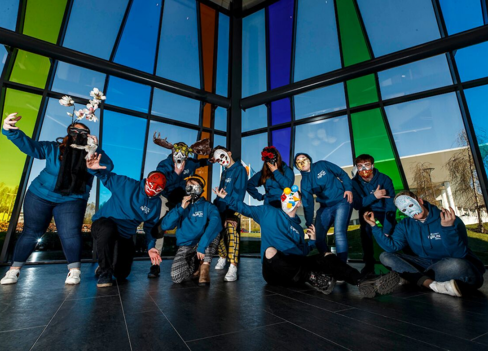 TU Dublin students posing wearing masks