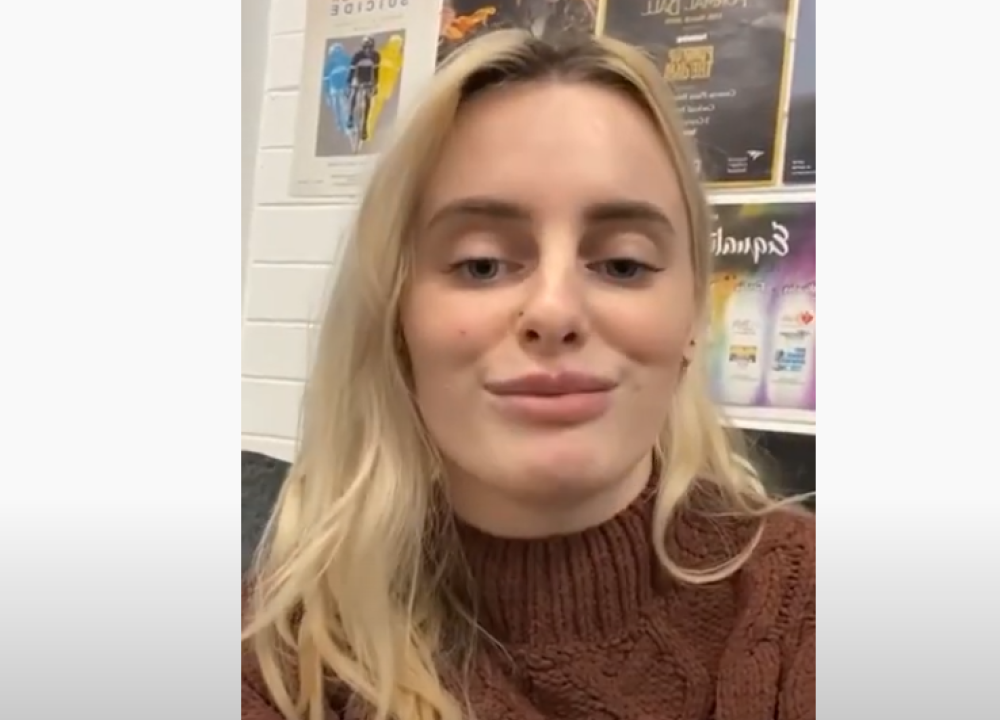 Screenshot of video of NCISU representative Síobhra Weir-Sharkey encouraging other students to take the survey